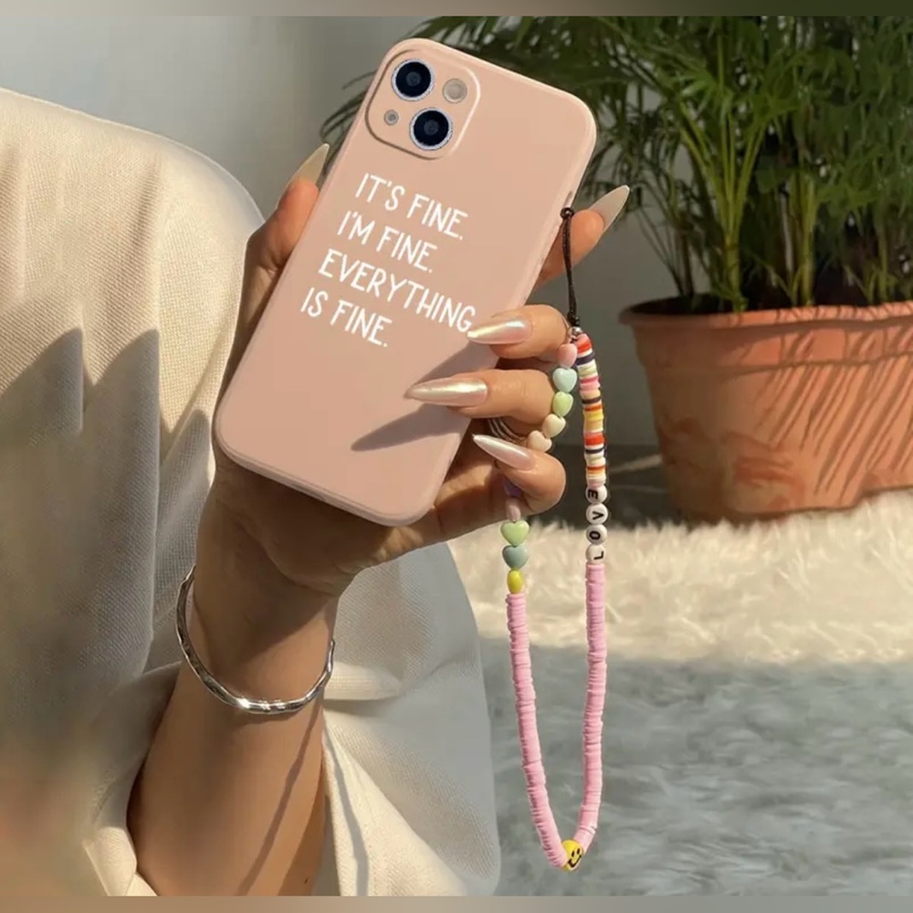 New iPhone 13 Pro case pink with beaded string attached